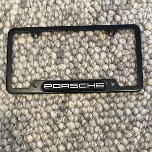 Porsche Design Black License Plate Frame with White Logo